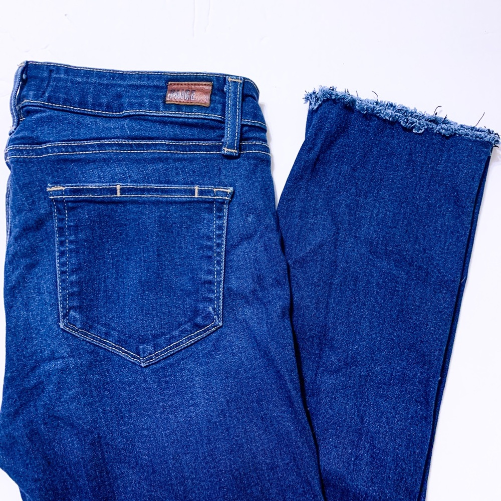 Dark wash Paige “Skyline Skinny” raw hem skinnies